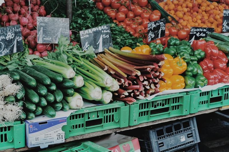 A display of fresh vegetables in crates